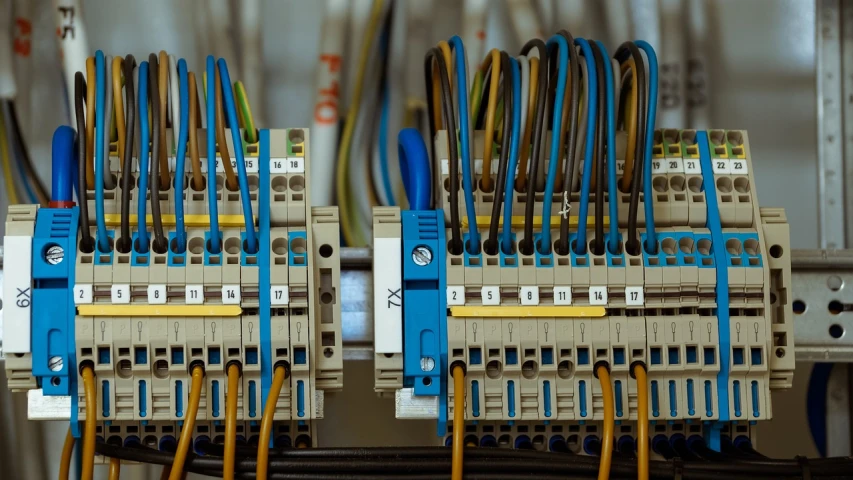 a bunch of wires that are connected to each other, pexels, art nouveau, control panels, blue and gold color scheme, very professional, crypto