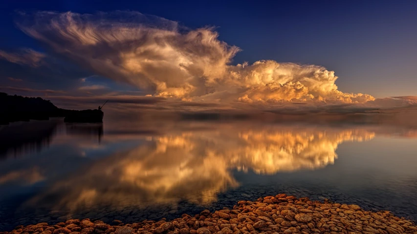 a body of water surrounded by rocks under a cloudy sky, a picture, romanticism, golden clouds, incredible reflections, giant cumulonimbus cloud, summer night