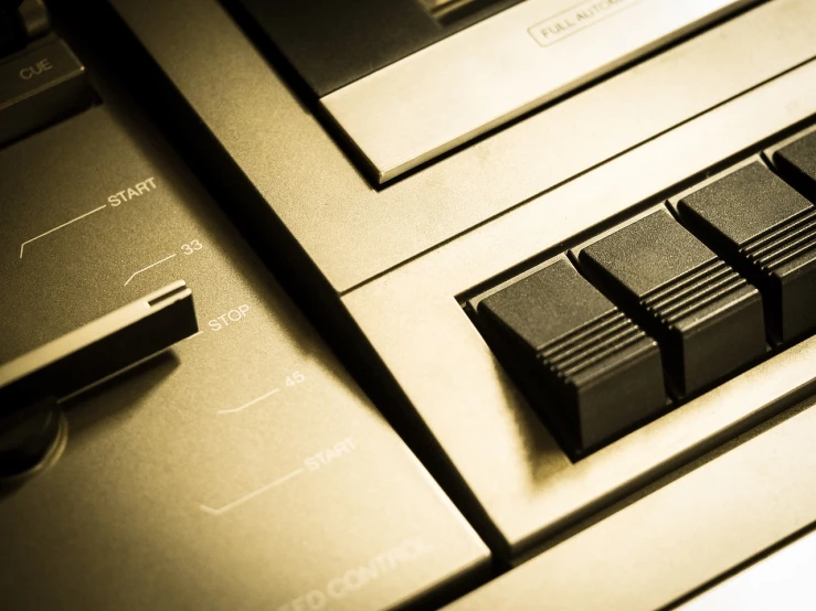 a close up of a close up of a keyboard, an album cover, inspired by John McLaughlin, computer art, sepia tone, snes, control panel, 1 9 8 0 s photo