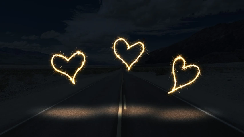 a couple of lights that are on the side of a road, graffiti, several hearts, houdini particles, enhancements, blog-photo