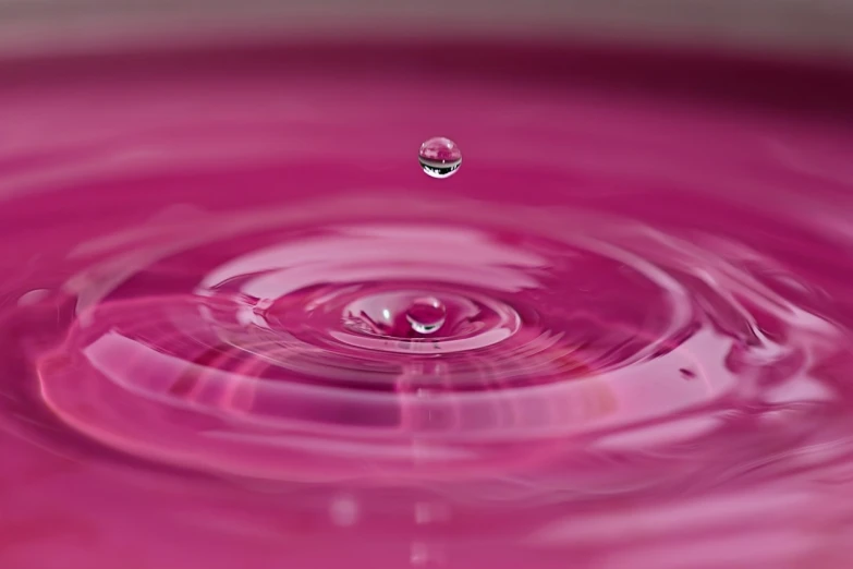 a drop of water falling into a pink bowl, a macro photograph, pixabay, renaissance, ripple effect, clean 4 k, 4k high res, wallpaper - 1 0 2 4