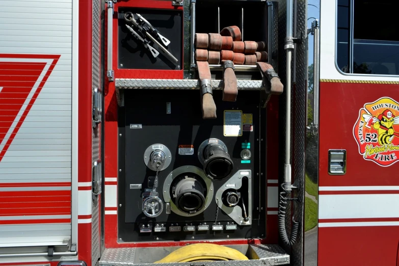 a close up of a fire truck with its door open, assemblage, firefighting gear, complex pattern, album photo, full shot photo