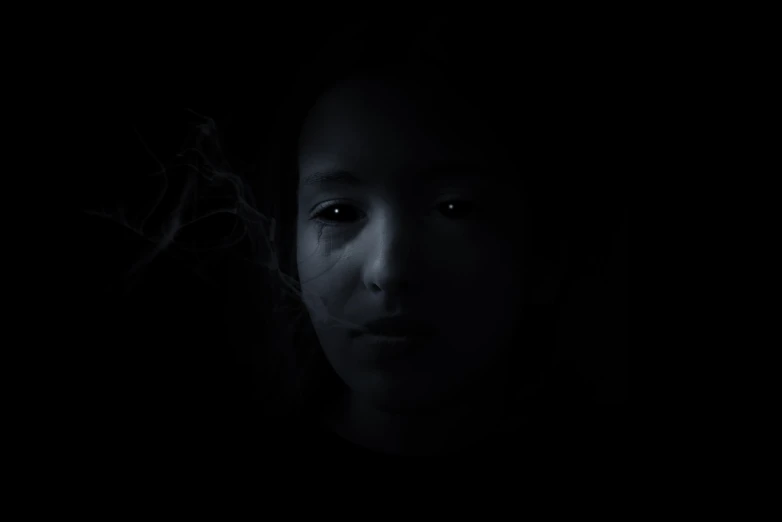 a close up of a person in the dark, a black and white photo, inspired by Gottfried Helnwein, hurufiyya, smoke out of her eyes, young asian girl, ghost children, portrait shot 8 k