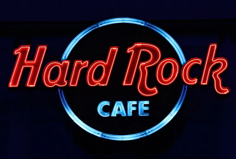 a neon sign that says hard rock cafe, flickr, photograph credit: ap, diner food, rock roof, 1/320