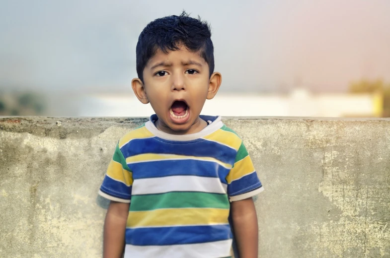 a young boy with a surprised look on his face, pexels, yawning, jayison devadas, ultra settings, well edited