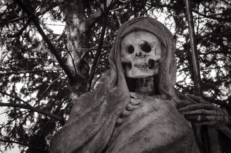 a black and white photo of a skeleton statue, by Jason Felix, gothic art, vampire nun, cementary of skulls, skull protruding from face, persephone as goddess of death