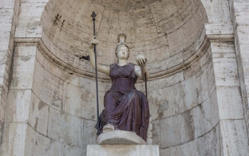 a statue of a woman holding a staff, a statue, by Antonio Cavallucci, shutterstock, throne of olympus, lorica segmentum, stock photo, halo over her head