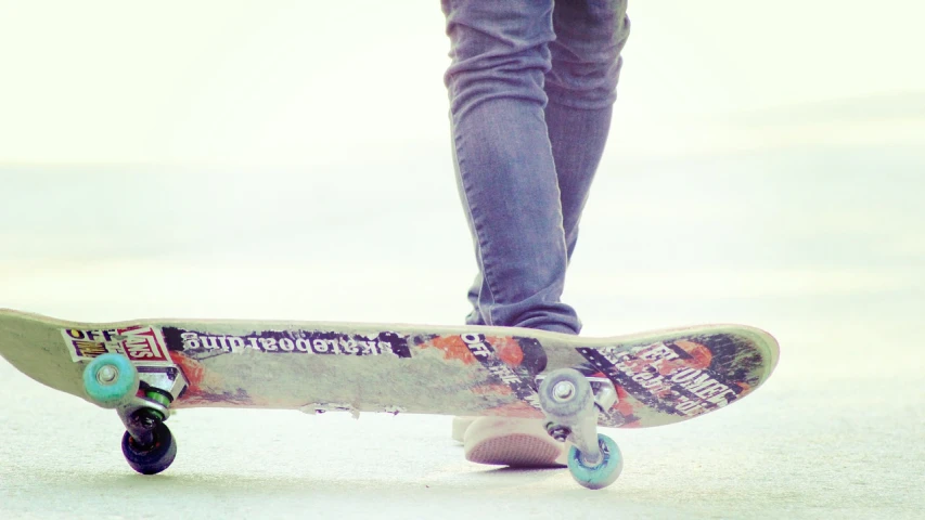 a person riding a skateboard down a street, by Matija Jama, tumblr, close-up on legs, stunning ski, deviantarz, faded!