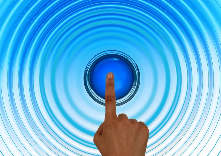 a close up of a person's finger pressing a button, a stock photo, by Julian Allen, trending on pixabay, interactive art, rippling water, blue energy, in front of a round, speech