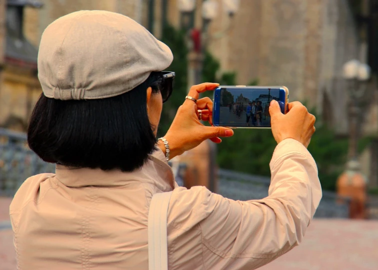 a woman taking a picture with her cell phone, by Jan Rustem, telephoto vacation picture, chinese, avatar image, transforming