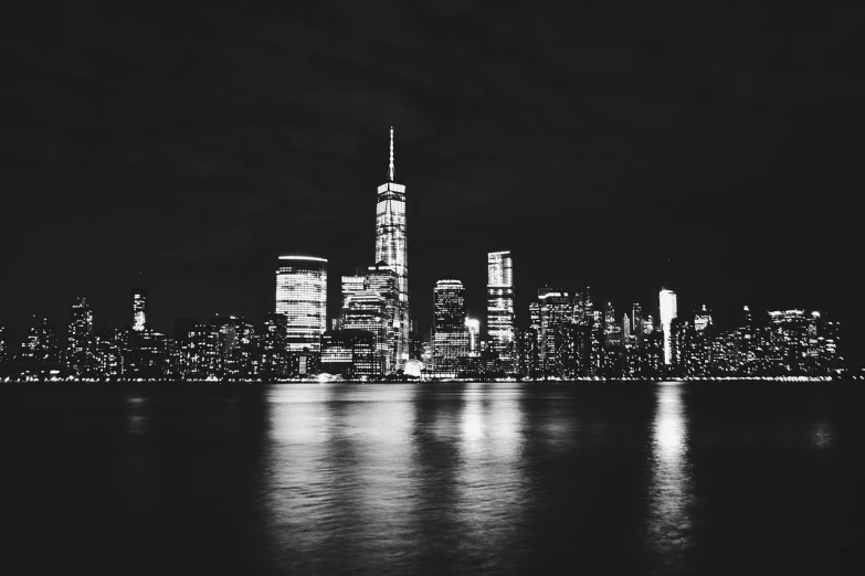 a black and white photo of a city at night, pexels, hq 4k phone wallpaper, new jersey, phone wallpaper, photo taken with an iphone