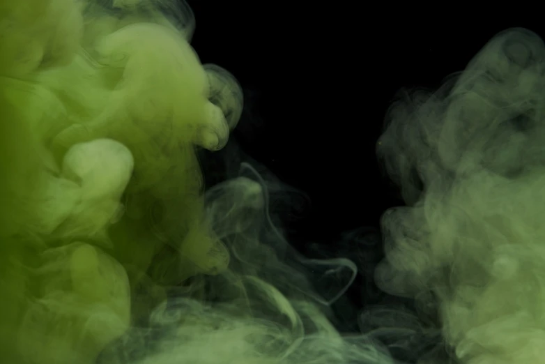 a close up of smoke on a black background, digital art, inspired by Kim Keever, shutterstock, gelatinous green goop, yellow volumetric fog, death is split in two with smoke, stock photo