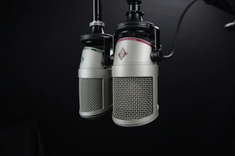 a couple of microphones sitting next to each other, photorealism, kyoto studio, radio box, product introduction photo