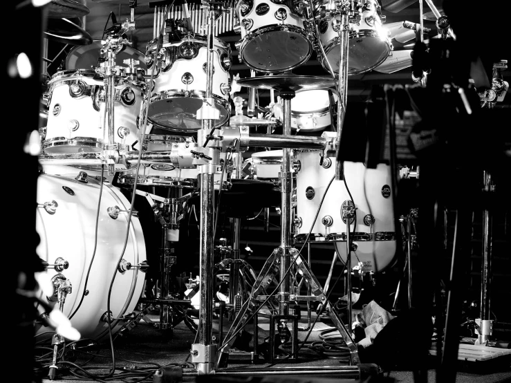 a black and white photo of a drum kit, by Steve Prescott, flickr, precisionism, rabbids at a metal concert, symmetry!! full shot!!, detailed white, stacked