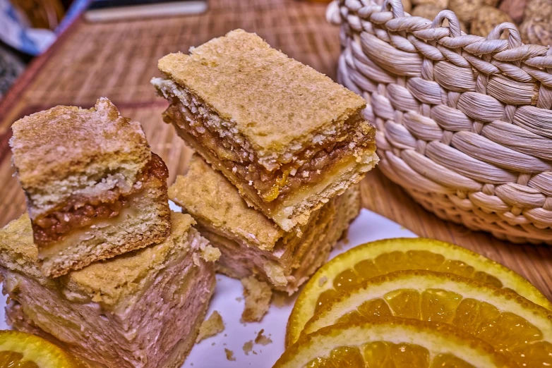 a close up of a plate of food with orange slices, a pastel, by Aleksander Kotsis, reddit, caramel, sandwich with fried tofu, highly detail wide angle photo, traditional corsican