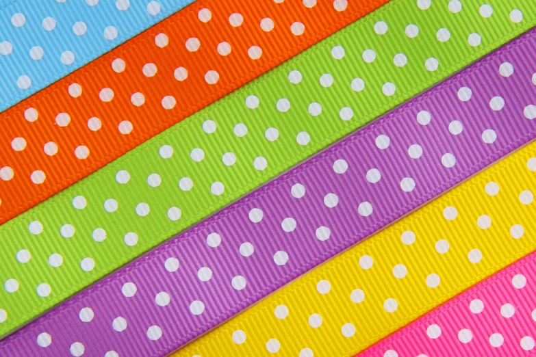 a bunch of different colored polka dot ribbon, a stock photo, inspired by Lisa Frank, flickr, frontal close up, 5 mm, full of colour 8-w 1024, spines