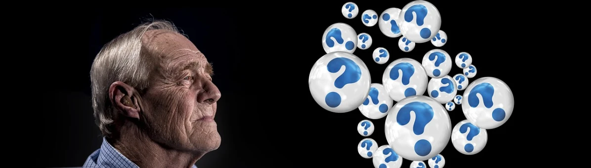a man standing in front of a bunch of blue eyes, by Paul Davis, pixabay, question marks, floating spheres and shapes, jeremy clarkson, 15081959 21121991 01012000 4k