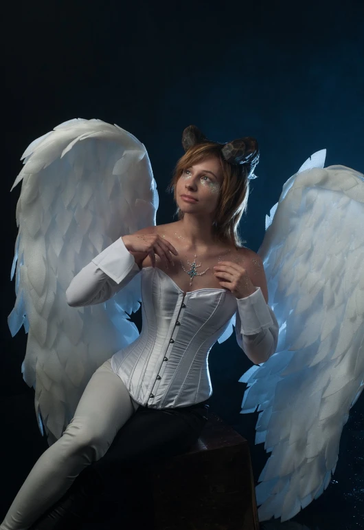 a woman dressed as an angel poses for a picture, a character portrait, inspired by Anne Stokes, furry art, very tight corset, in a photo studio, mechanical wings, attractive cat girl