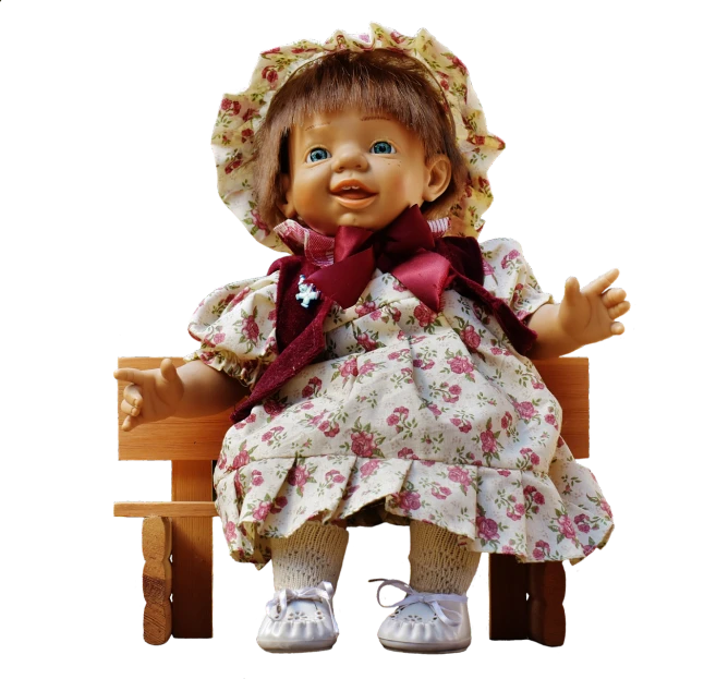 a doll sitting on top of a wooden bench, a portrait, by Eugeniusz Zak, pixabay contest winner, mingei, cute decapodiformes, toddler, 2004, dressed in a flower dress