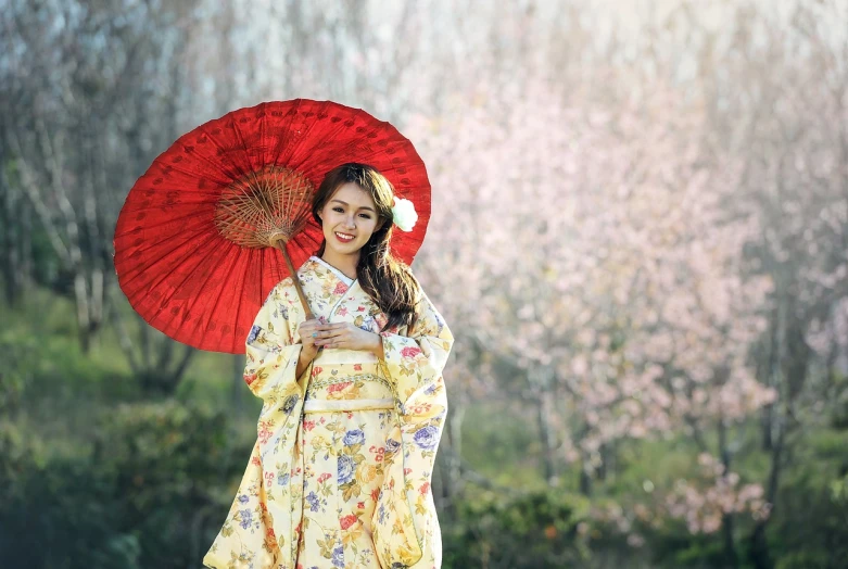 a woman in a kimono holding a red umbrella, a picture, inspired by Hishikawa Moronobu, pixabay, 🌸 🌼 💮, with a beautifull smile, chinese girl, wearing floral chiton