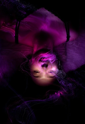 a woman that is laying down in the dark, digital art, magenta lighting. fantasy, inside head cobwebs, abstract purple lighting, ethereal angelic being of light