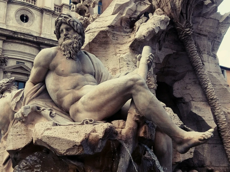 a statue of a man sitting on top of a fountain, a statue, by Gian Lorenzo Bernini, shutterstock, exaggerated muscle physique, photo taken with an iphone, market in ancient rome, lewd