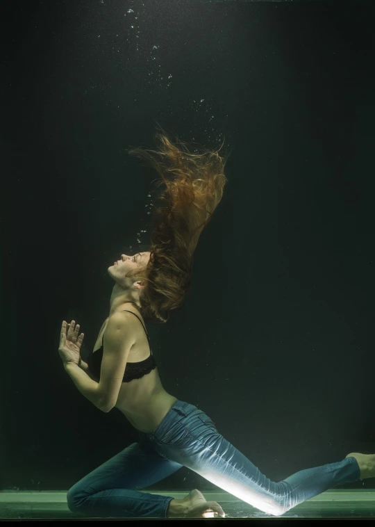 a woman in a bikini swims under water, inspired by Brooke Shaden, renaissance, young redhead girl in motion, shot with a arriflex 35 ii, floating long hair, isolated