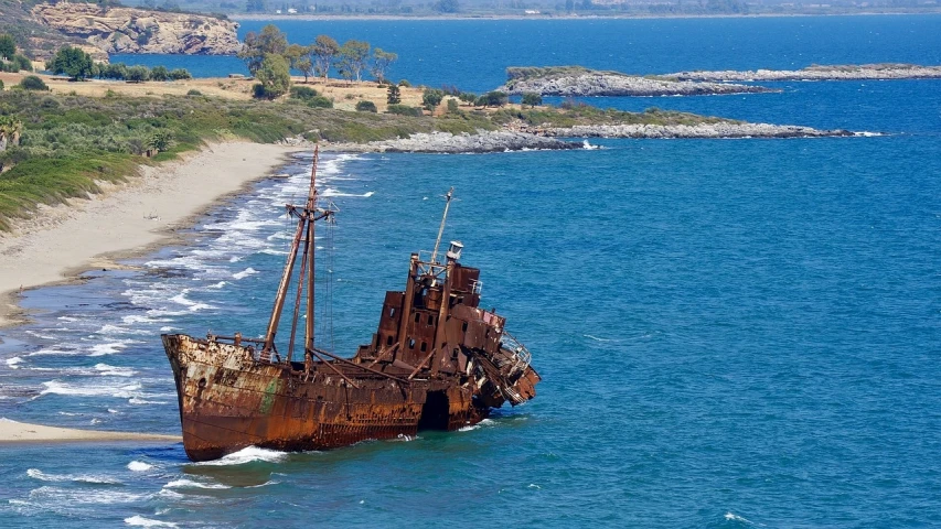 a rusted ship in the middle of a body of water, pixabay, cyprus, monster ashore, photograph credit: ap, shot from 5 0 feet distance