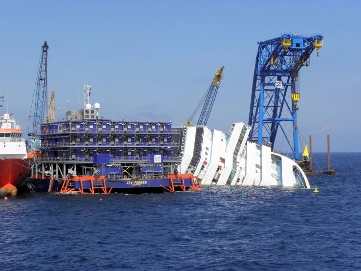 a large ship sitting in the middle of a body of water, scaffolding collapsing, björk, italian, giga