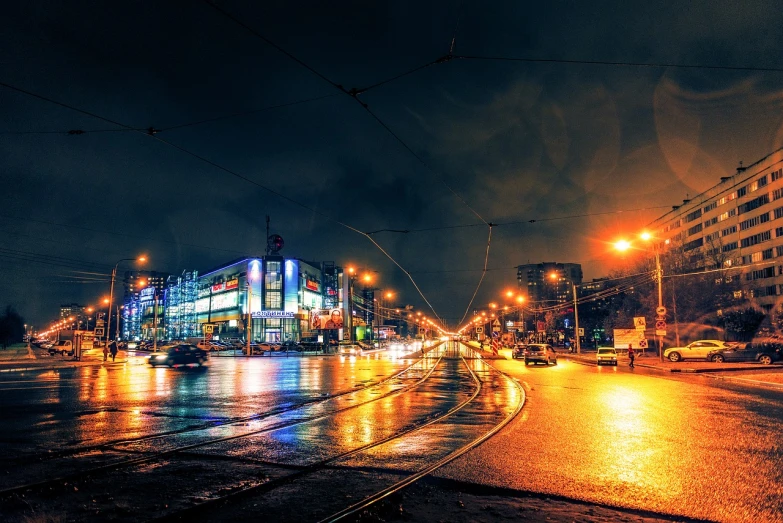 a city street filled with lots of traffic at night, by Alexander Bogen, flickr, realism, rostov city, rainy stormy night, street tram, post-processed