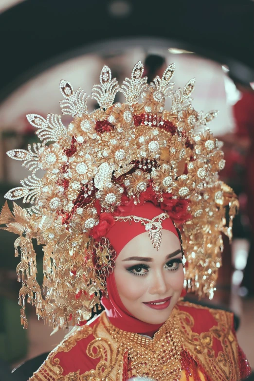 a close up of a person wearing a costume, a picture, by Basuki Abdullah, shutterstock, sumatraism, luxurious wedding, square, headpiecehigh quality, silver gold red details