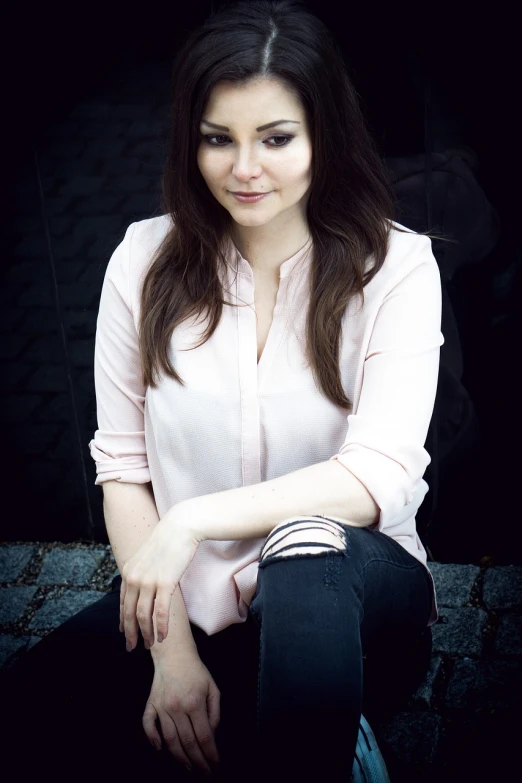 a woman in a pink shirt and black pants, a portrait, by Zofia Stryjenska, tumblr, romanticism, stockholm city portrait, girl with dark brown hair, white shirt and jeans, aurora aksnes