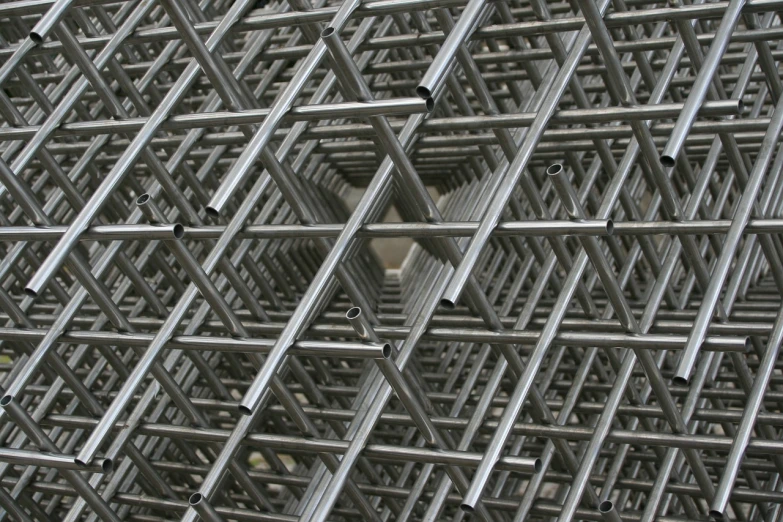 a bunch of metal bars stacked on top of each other, inspired by Richard Anuszkiewicz, unsplash, detailed grid as background, scaffolding, featuring rhodium wires, cubic