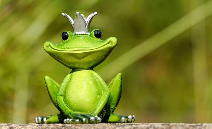a figurine of a frog with a crown on its head, a picture, pixabay contest winner, happy appearance, iphone wallpaper, green clothes, 😃😀😄☺🙃😉😗