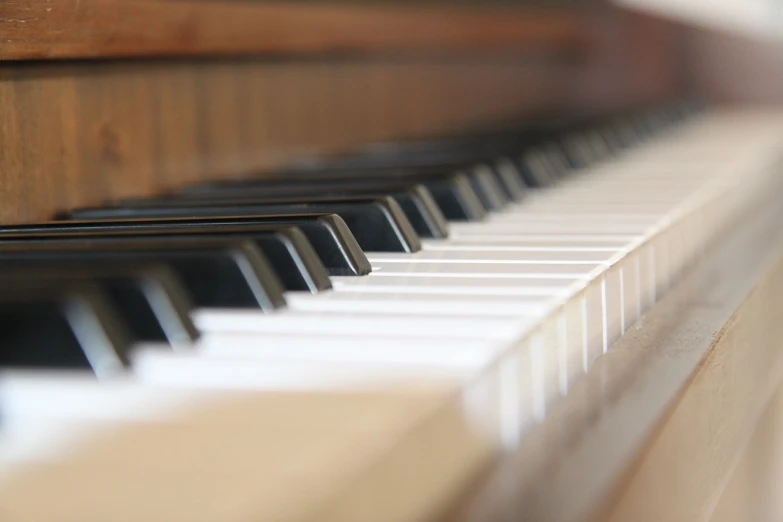 a close up of the keys of a piano, a picture, minimalism, shallow depth of fielf, low angle photo, high details photo, flash photo