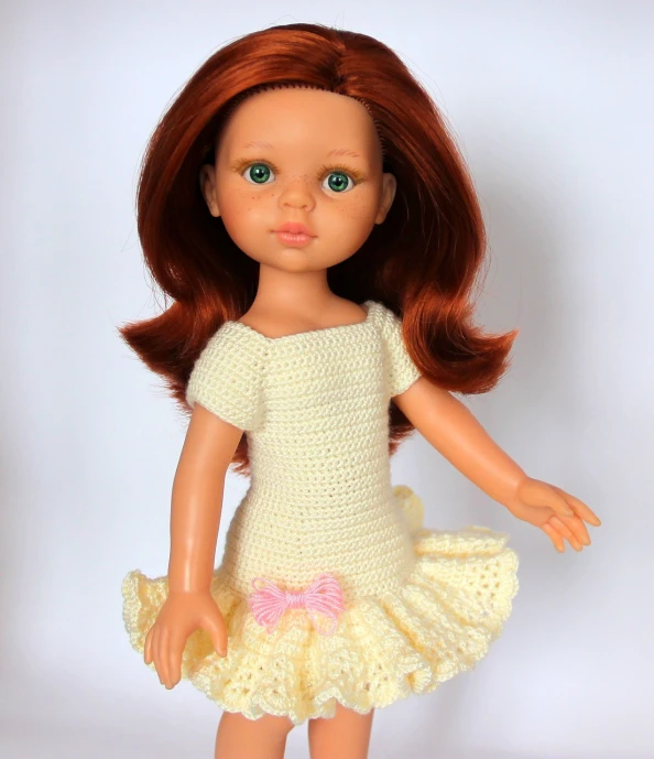 a close up of a doll wearing a dress, arabesque, crochet skin, nico wearing a white dress, full body image, monika