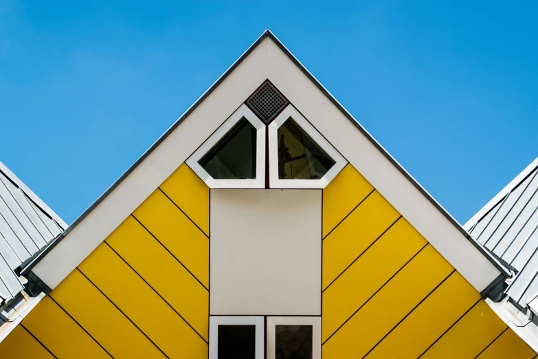 a yellow and white building with two windows, by Frederik Vermehren, unsplash, de stijl, simple gable roofs, bright macro view pixar, symetrical face, dutch tilt