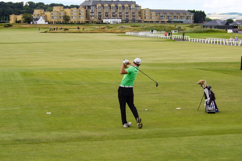 a man swinging a golf club at a golf course, by Robert Brackman, flickr, scottish style, karolina cummings, emma, july 2 0 1 1