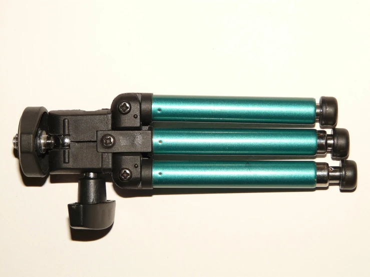 a close up of a camera on a tripod, dada, cyan and green, rod rays, sigma 1/6, tri - gun