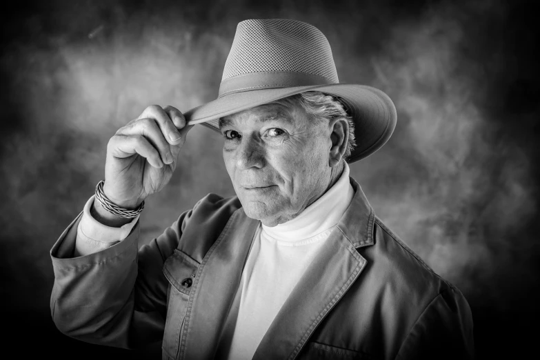 a black and white photo of a man wearing a hat, inspired by Yousuf Karsh, fine art, grey hair and a cowboy hat, henrik fisker, tourist photo, jr ewing from dallas