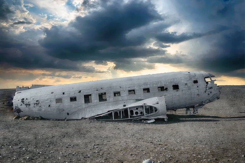 a large airplane sitting on top of a dirt field, a detailed matte painting, pixabay contest winner, surrealism, photo of poor condition, iceland photography, detailed crash space ship, museum masterpiece
