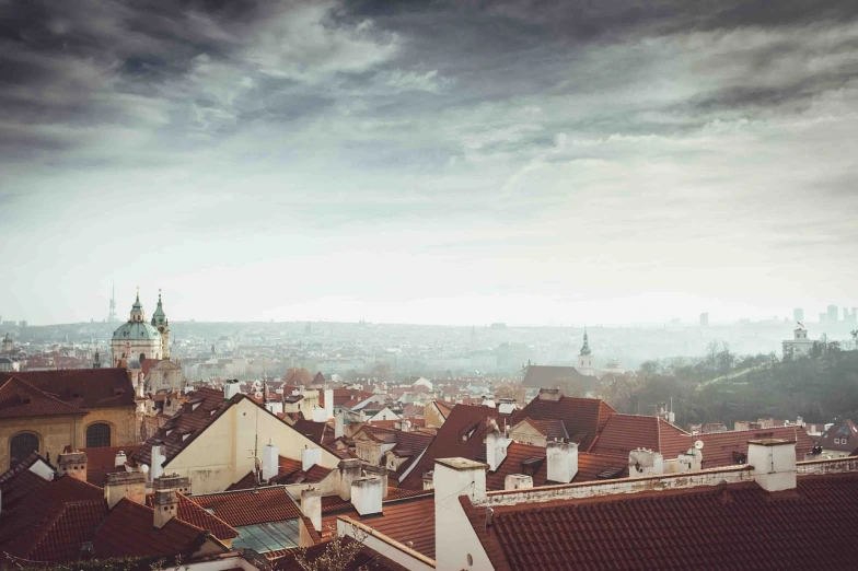 a view of a city from the top of a hill, by Antoni Brodowski, shutterstock, baroque, gloomy medieval background, roof background, 7 0 mm photo, wide film still