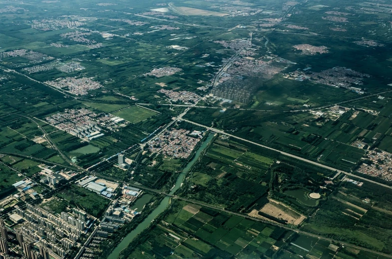 an aerial view of a city from a plane, a picture, baotou china, dutch landscape, full res, verdant and lush and overgrown