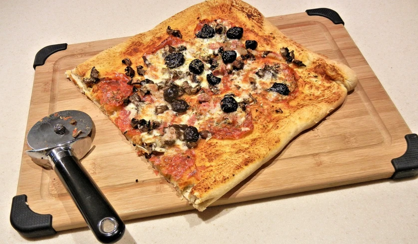 a pizza sitting on top of a wooden cutting board, inspired by Géza Dósa, lamb and goat fused as one, modified, square, at home