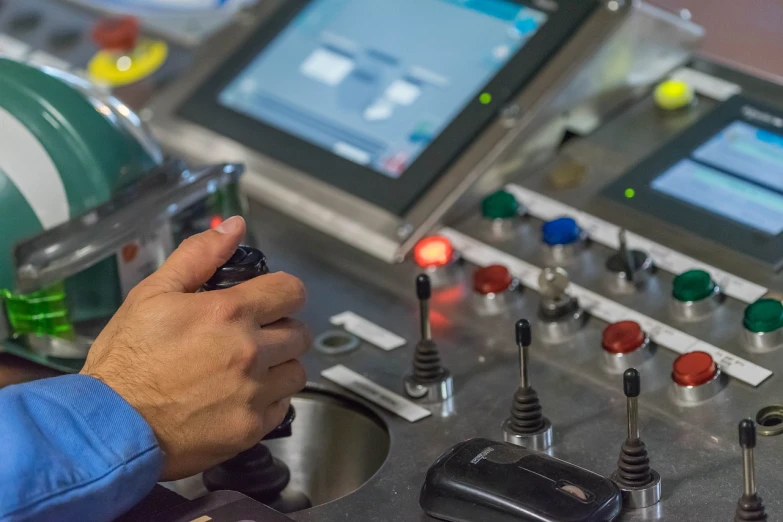 a close up of a person playing a video game, les automatistes, ship control panel close-up, industrial machinery, avatar image, portlet photo