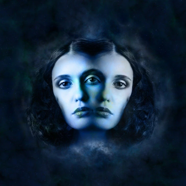 a close up of a woman's face on a dark background, a portrait, inspired by Anna Füssli, shutterstock, surrealism, beautiful gemini twins portrait, emanating with blue aura, symmetrical face illustration, portait photo