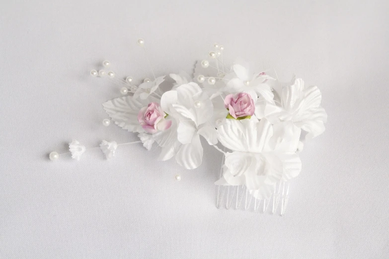 a close up of a hair comb with flowers and pearls, a picture, inspired by François Boquet, 3 d giant orchid flower, miniature product photo, composer, carnation