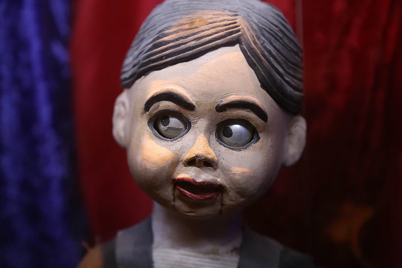 a statue of a woman with a creepy look on her face, inspired by Junji Ito, folk art, ventriloquist dummy, closeup - view, cronenberg automata, 360*
