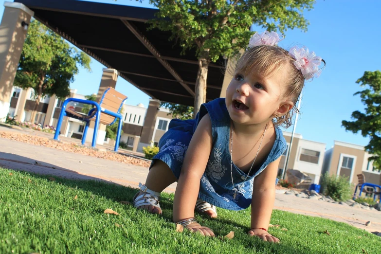 a little girl is crawling on the grass, by Matt Cavotta, on the sidewalk, full res, low camera angle, really realistic