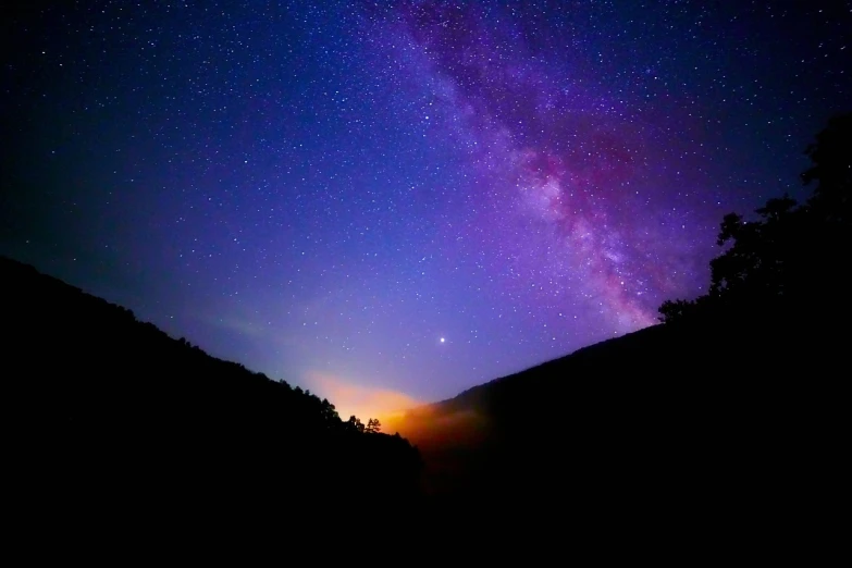 a sky filled with lots of stars next to a forest, a picture, by Cedric Peyravernay, flickr, glowing colorful fog, the milk way up above, fire from sky, summer night